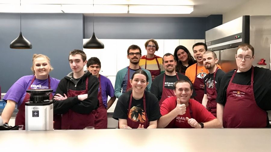 A group of SOAR students in the kitchen