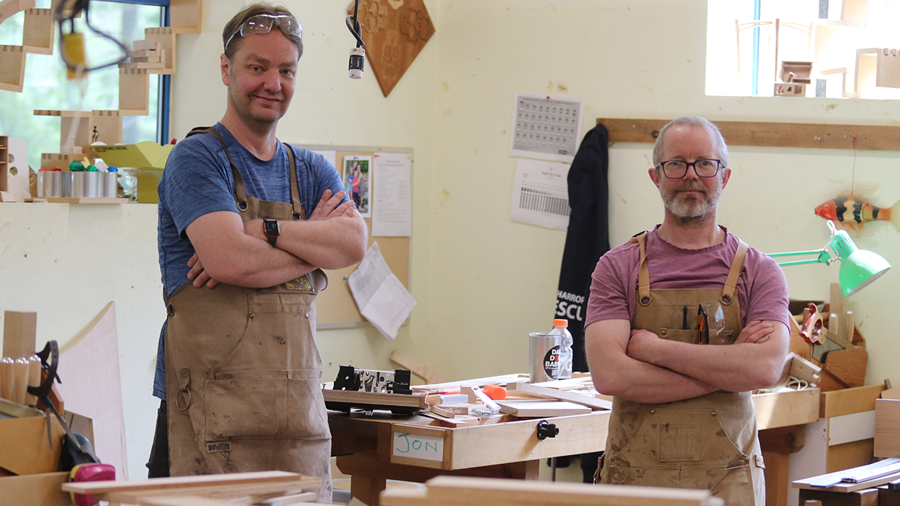 Two of the students who will presenting pieces in the Fine Woodworking Show &amp; Sale, Jon Breisnes and Jacques Beaurain (right) take a break from the final days of preparation.