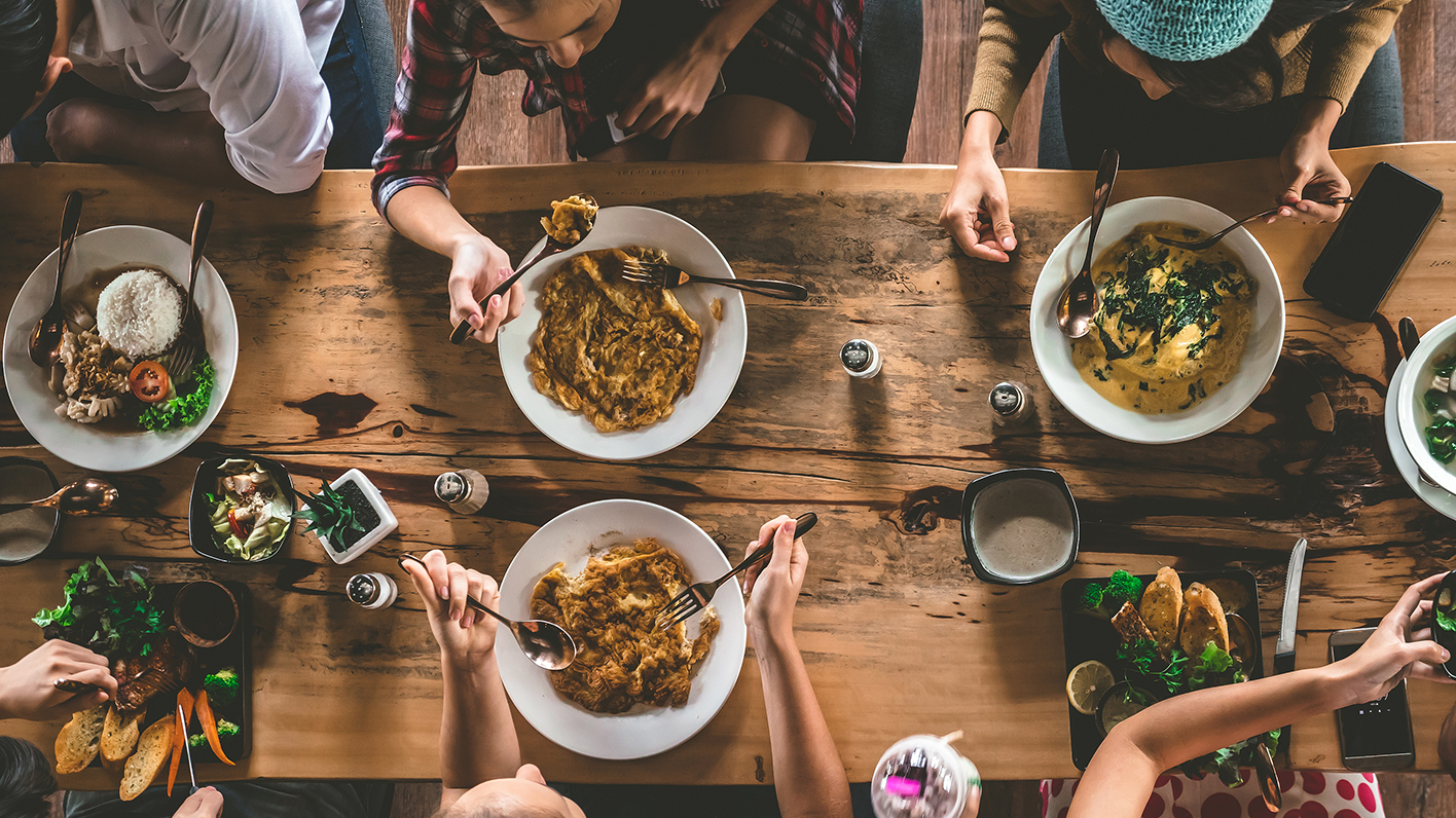 Plates of food at a dinner basket conversation