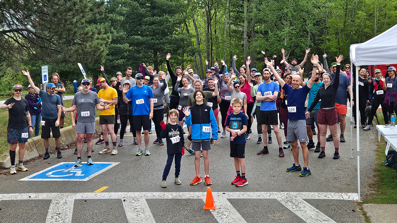 Partcipants at the Giving Day Trail Run on the Castlegar Campus gather at the start line.