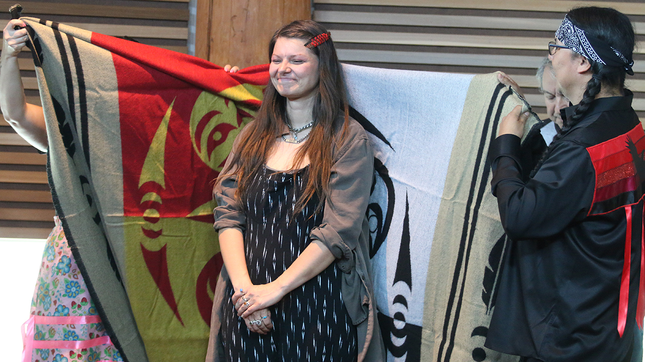 Blanket cermony with student at Indigenous grad ceremony
