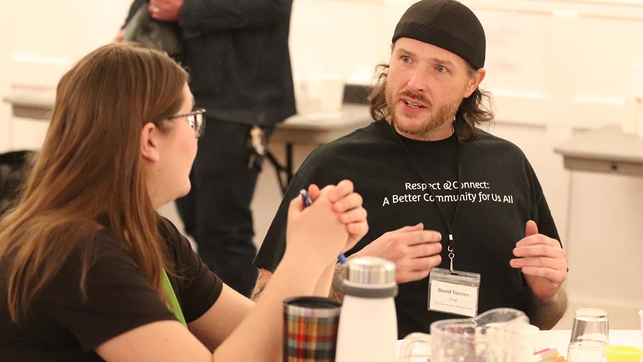 Table conversations at the homelessness summit.