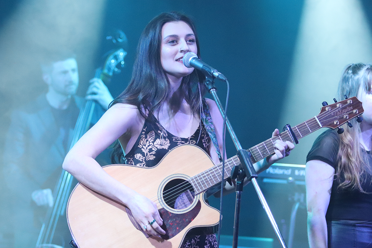 Music student singing at the Shambhala Music &amp; Performance Hall
