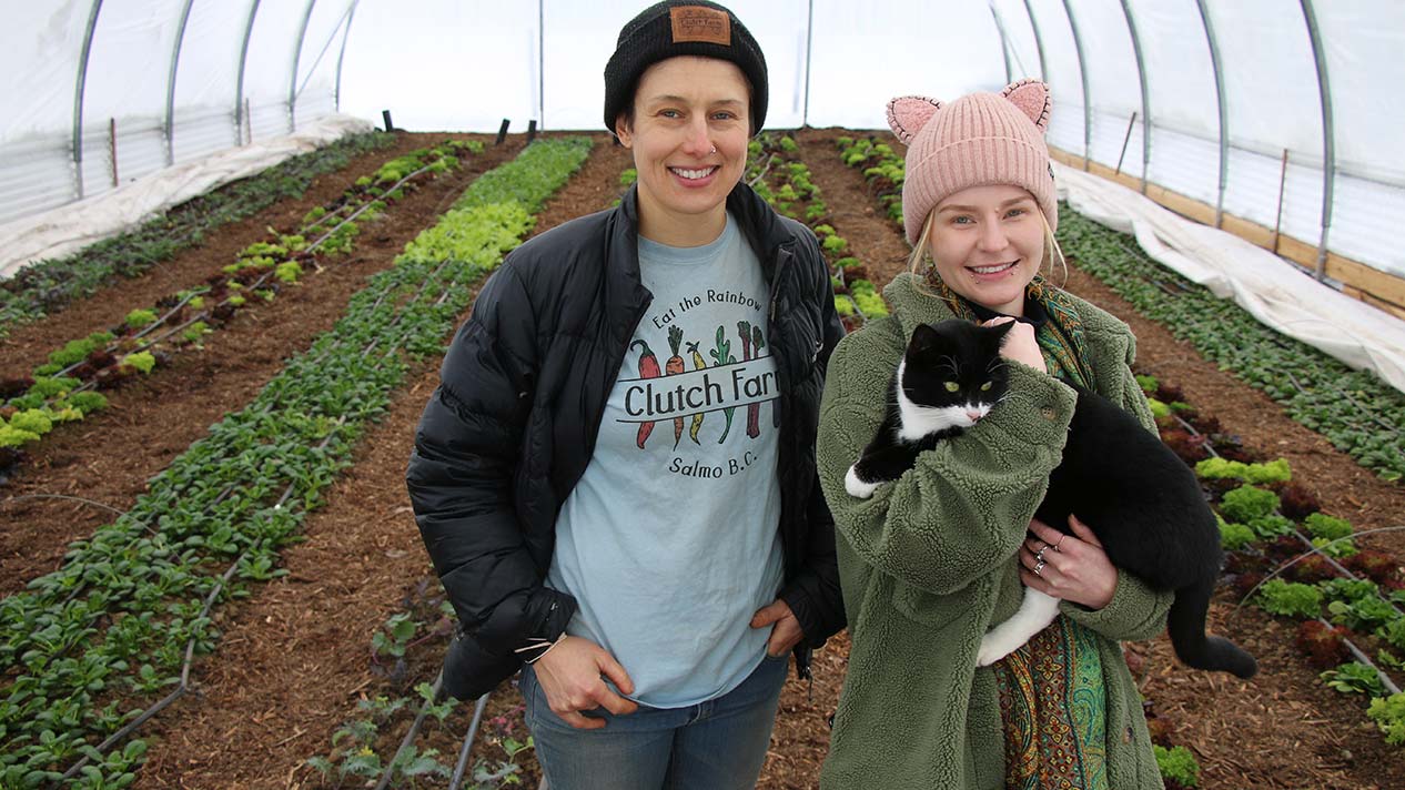 Cltuch Farm owner Mel Weston and Selkirk College Sustainability Coordinator Kayla Tiliapaugh in the greenouse
