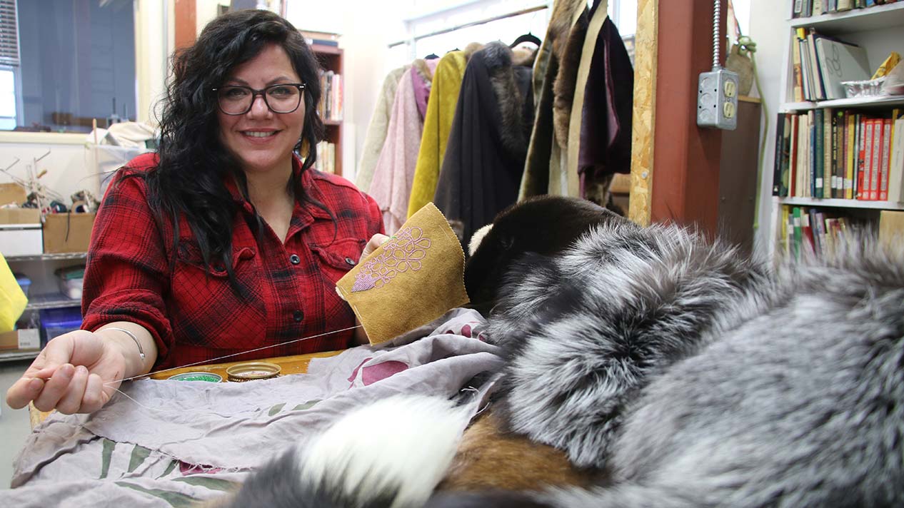 Naomi Bourque creating her ponchos