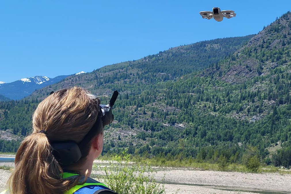 A student flies a drone outside
