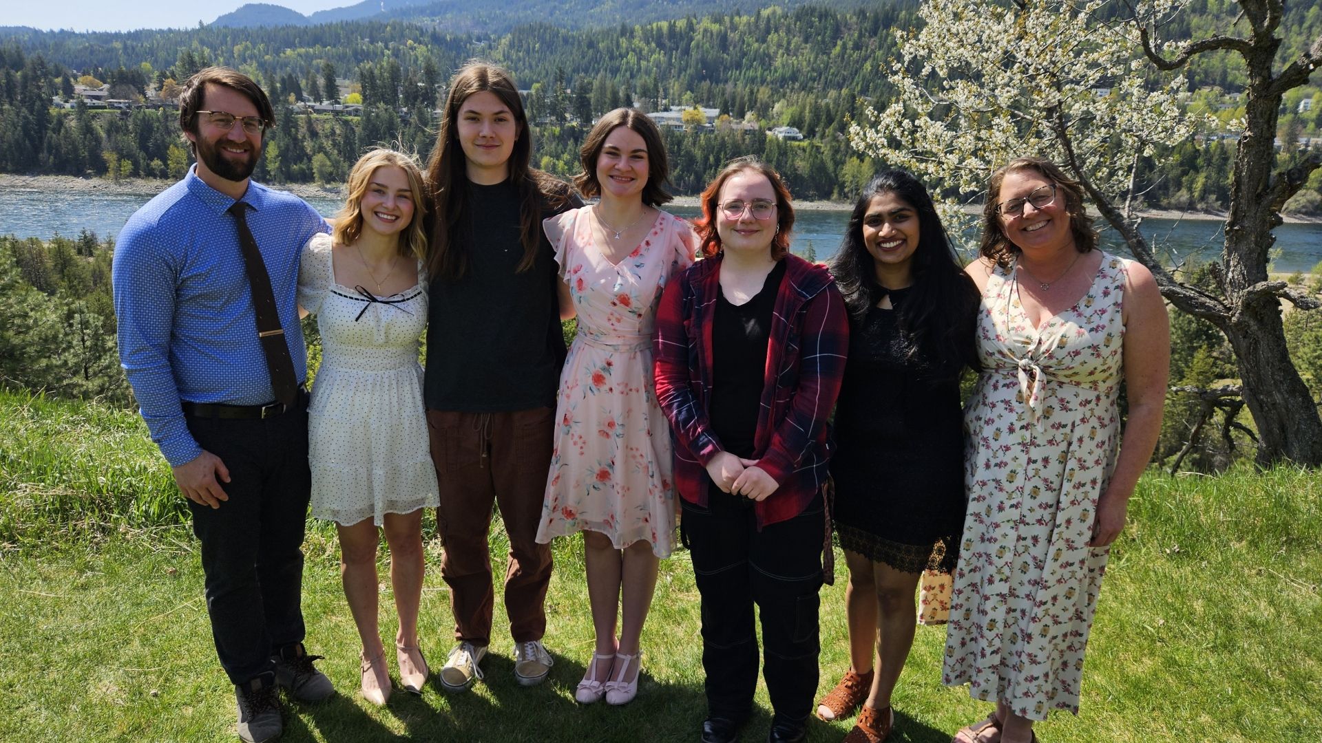 The RPM graduates pose with their program coordinators near the Columbia River.