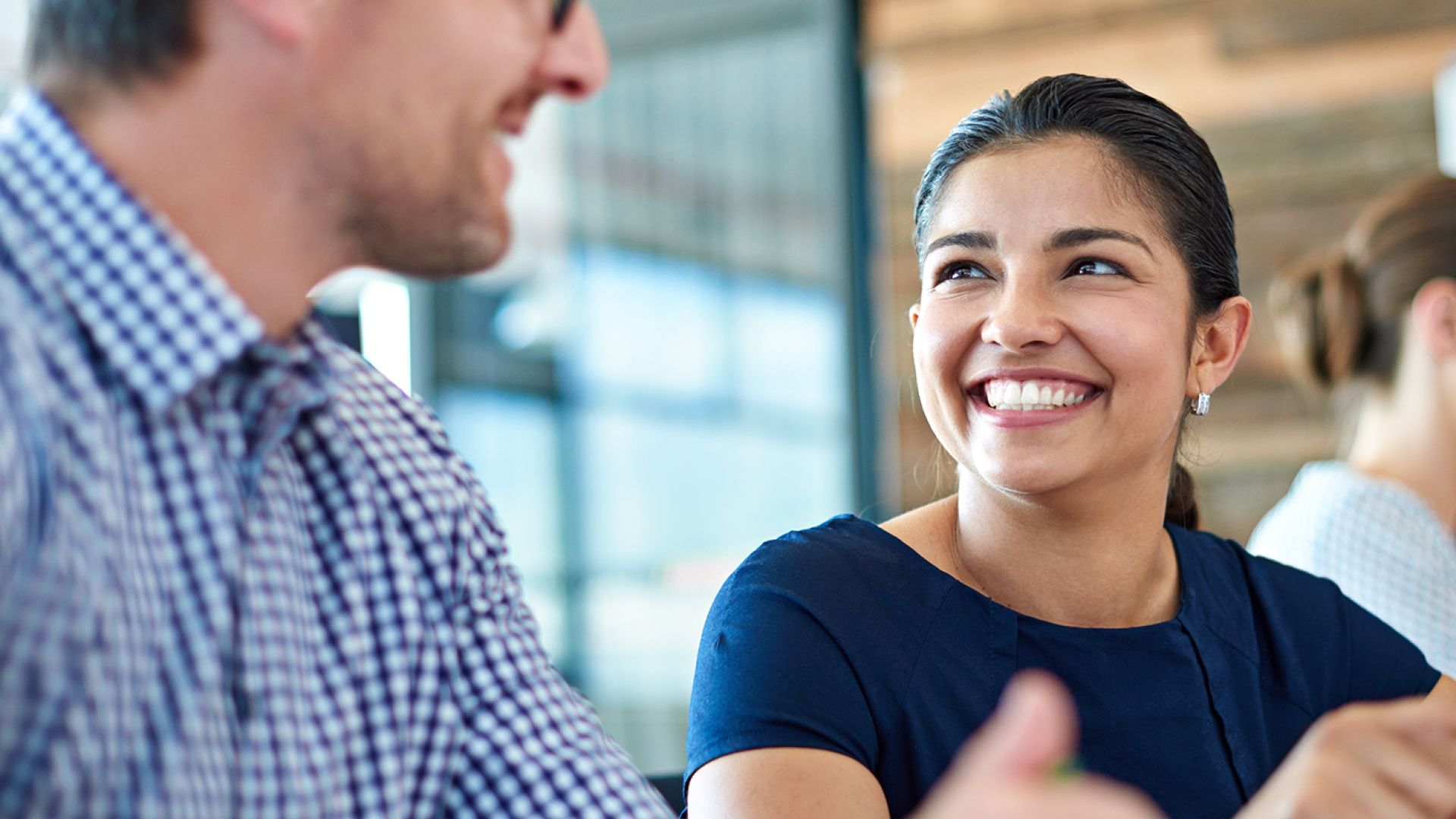 lady smiling while attending a employment workshop