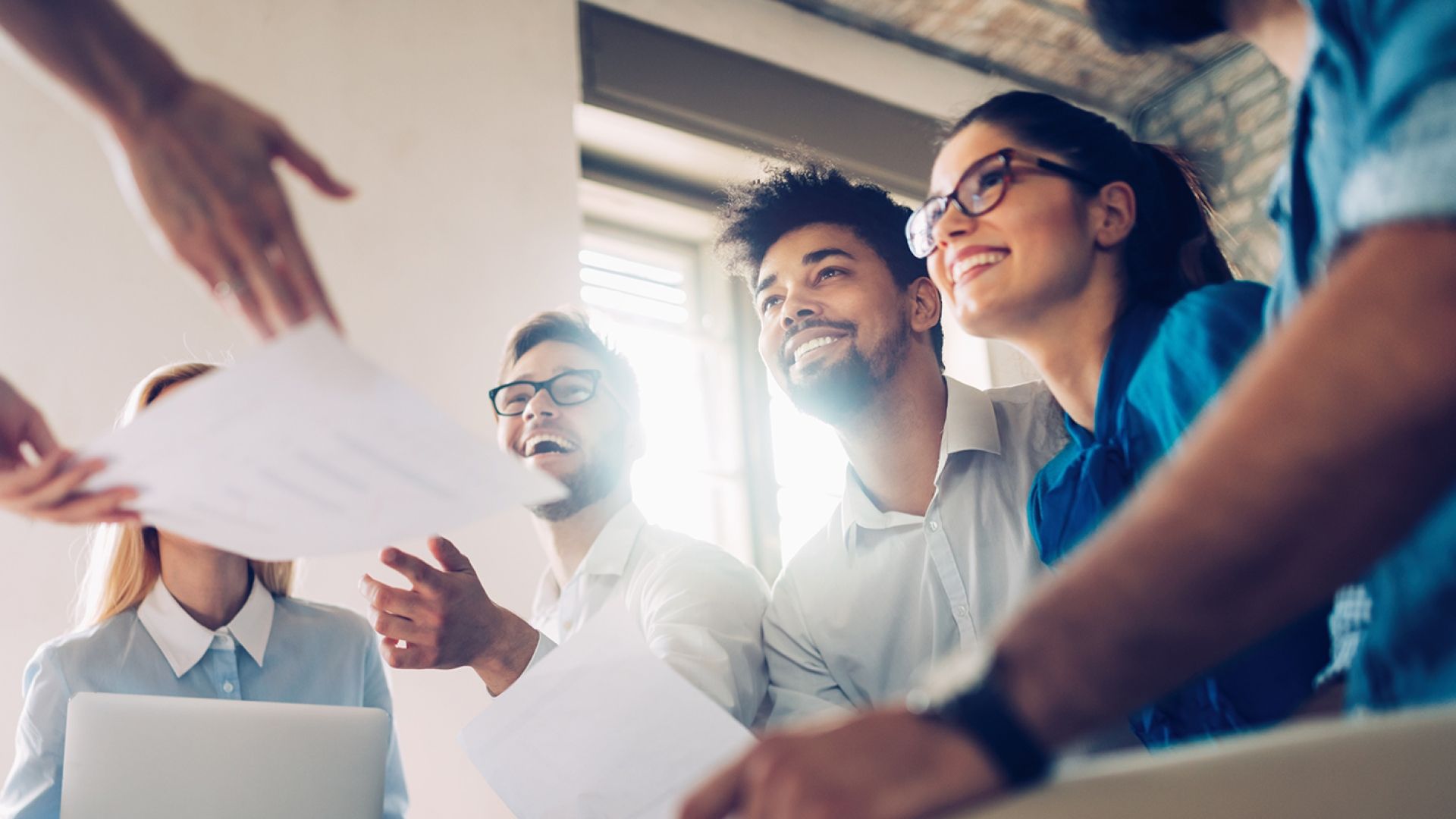 people in a writing resume workshop