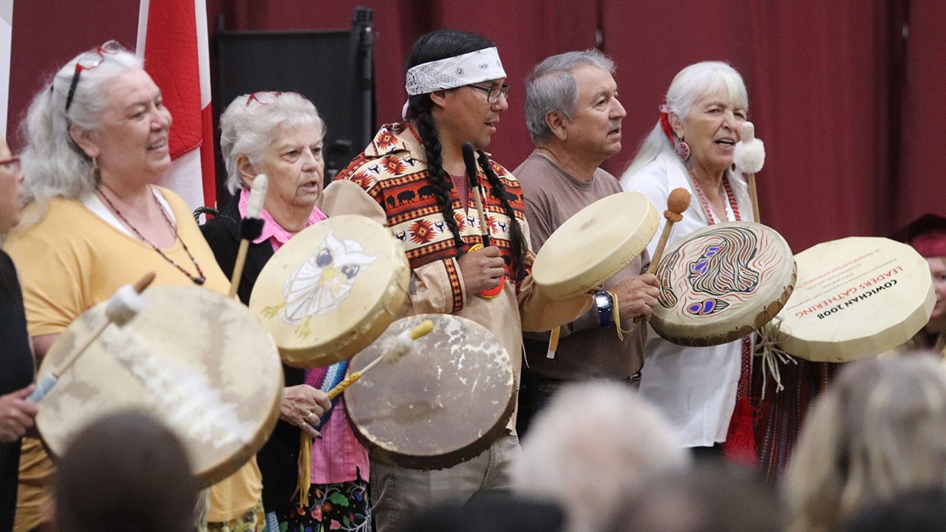 Indigenous drummers at Convocation 2024 on drums