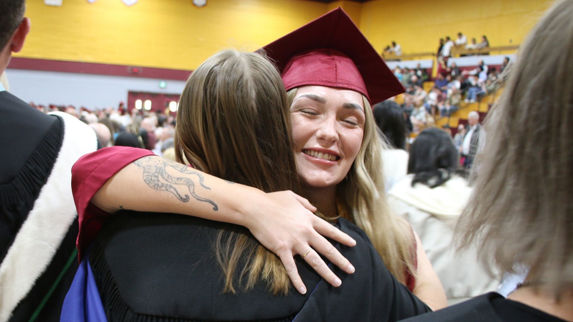 Selkirk College Nursing Program grad hugs instructor