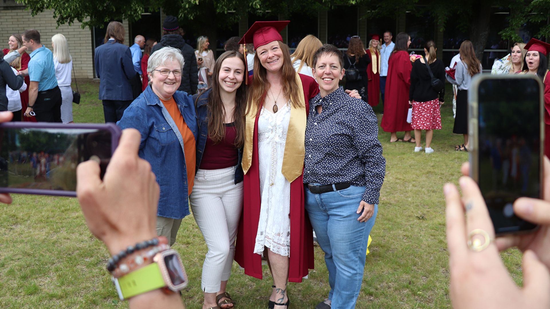 Families take photos of grads