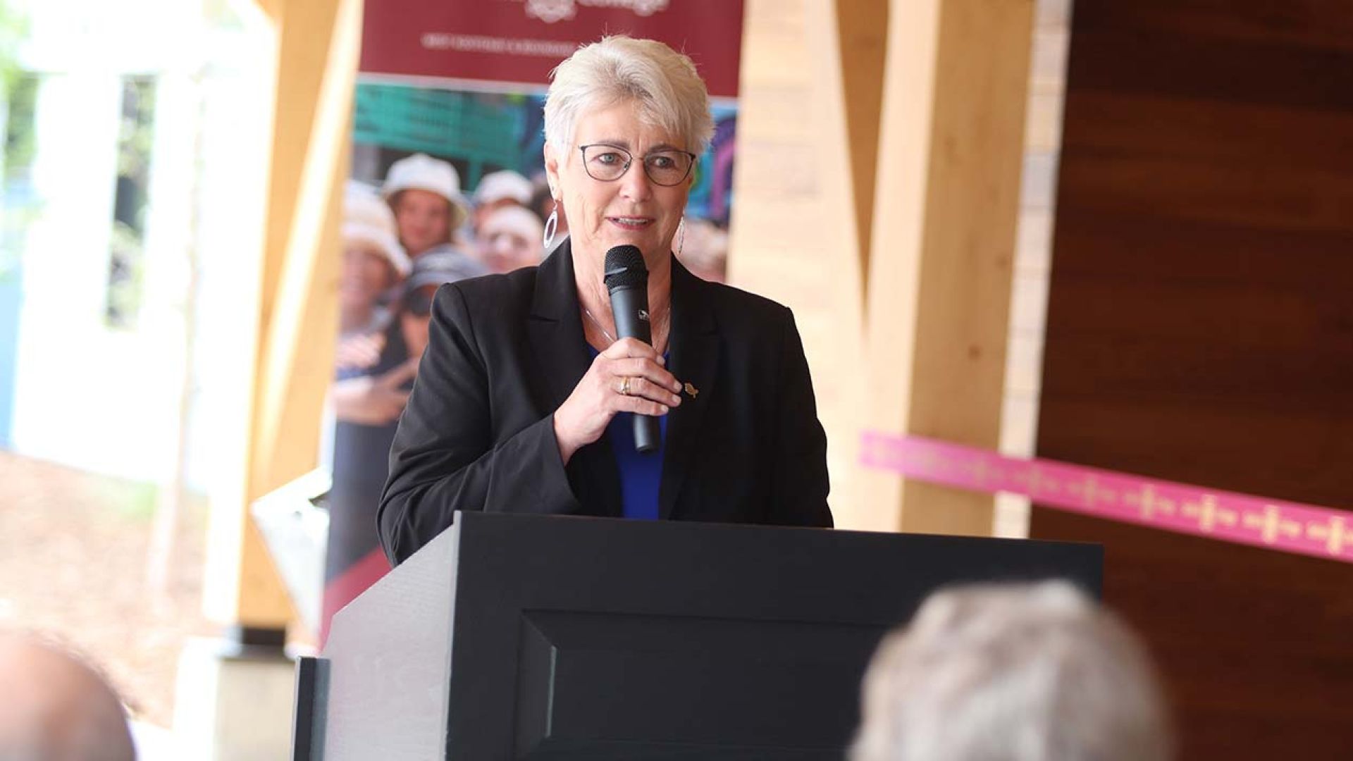 Kootenay West MLA and Finance Minister Katrine Conroy speaks at the opening of the student housing