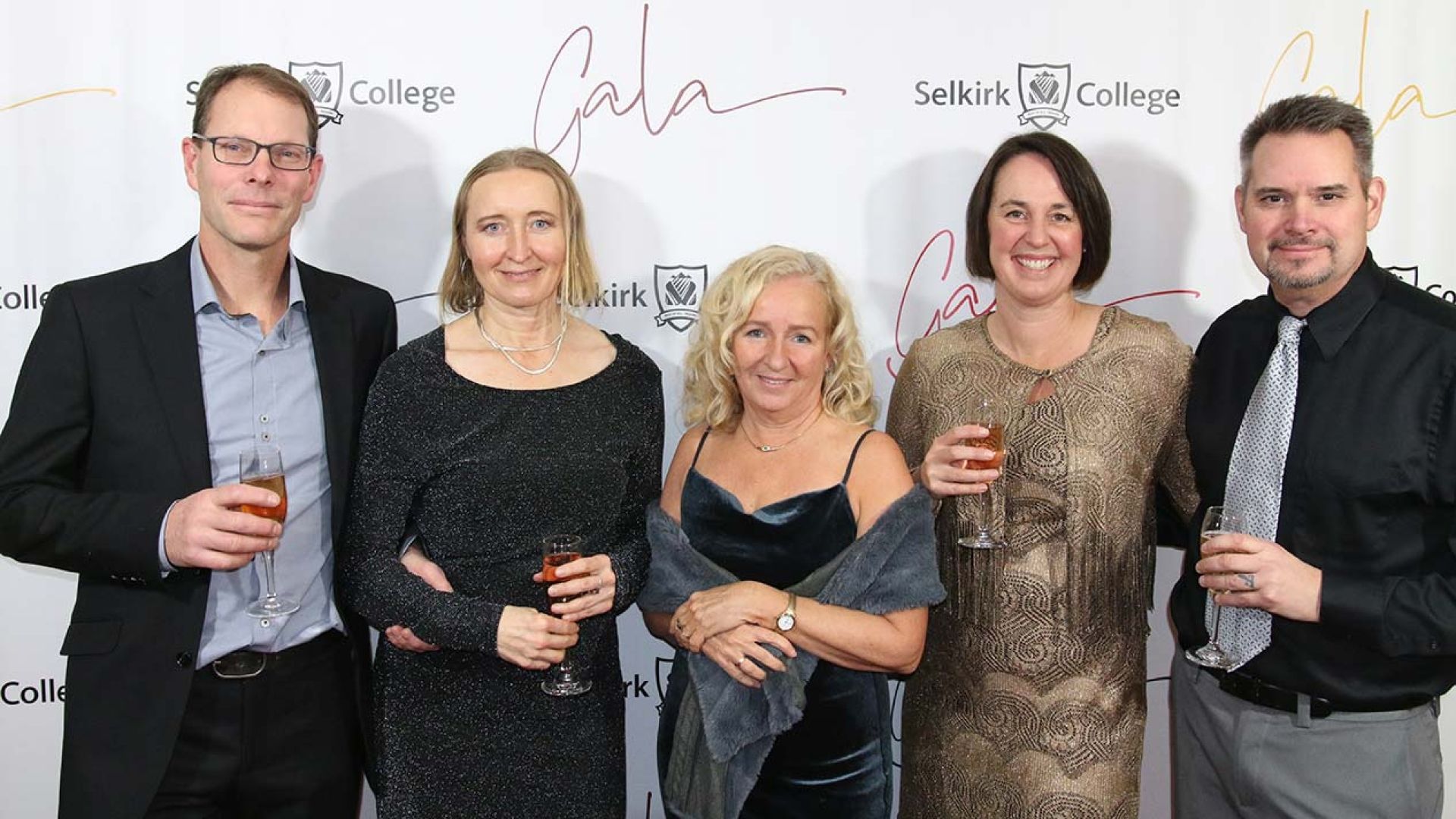 Red carpet photo with group of supporters