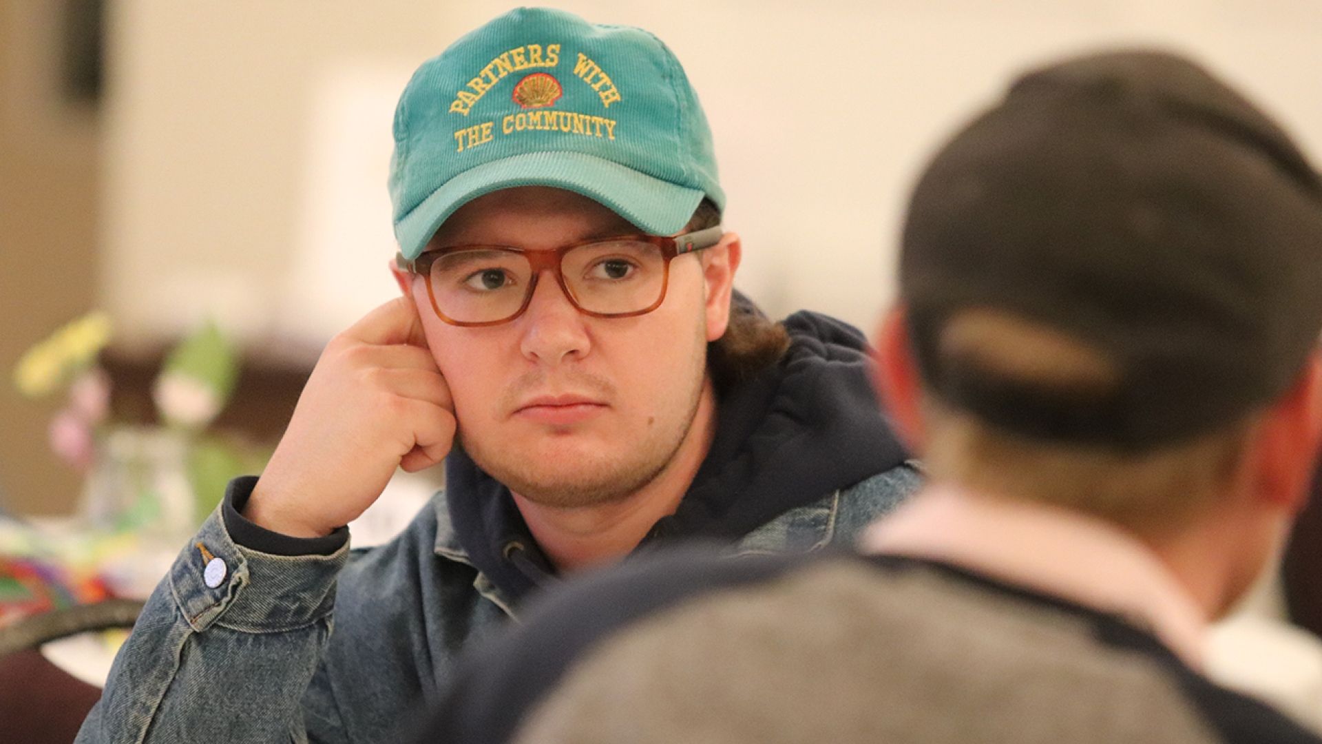 Nursing Program student Joel Aubert in table conversation