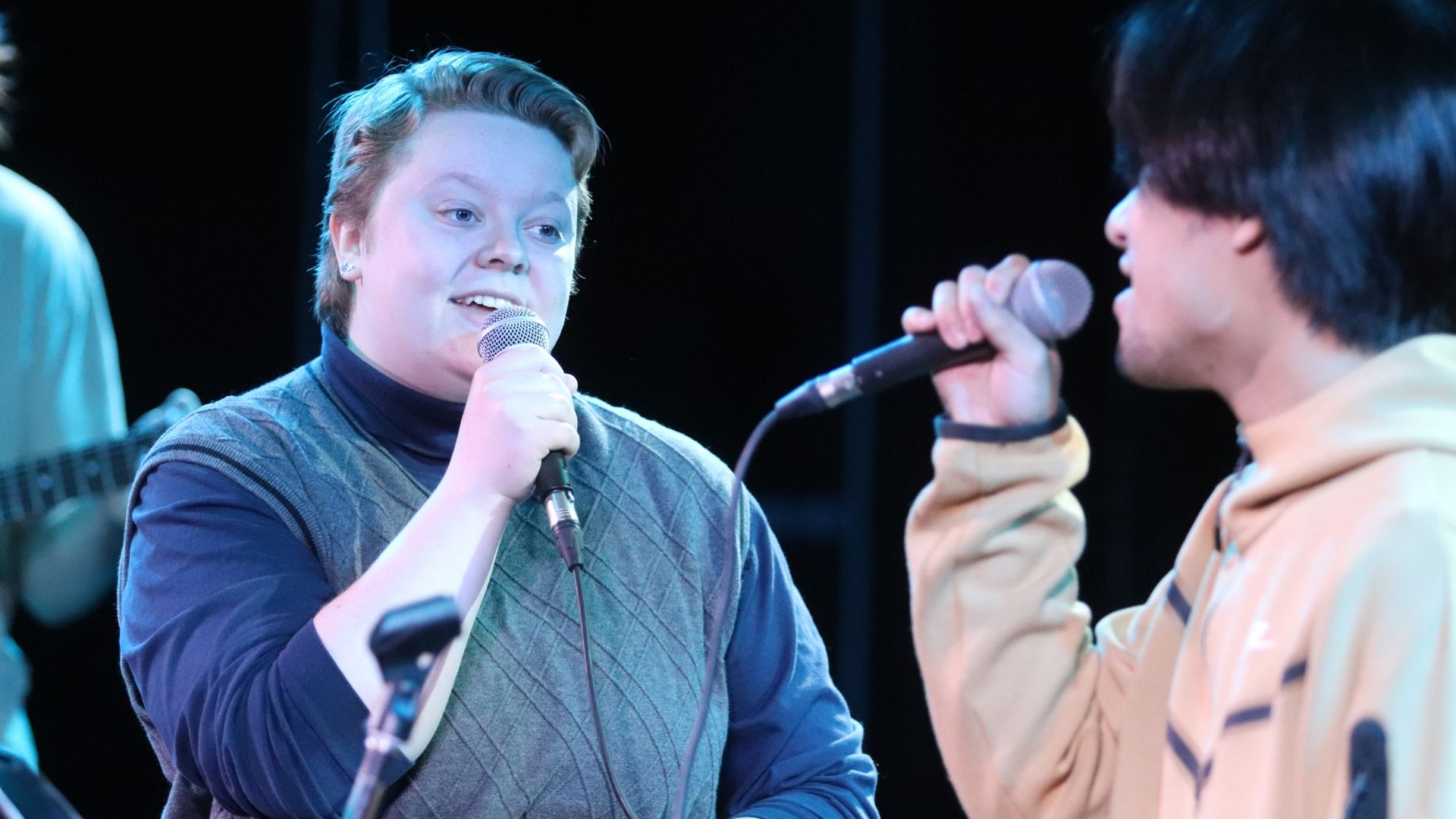 Selkirk College music students sing on stage