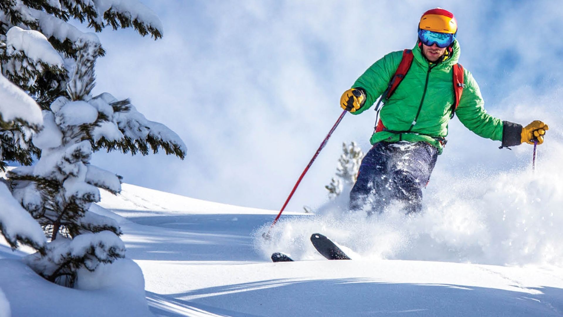 A skier wearing a green jacket