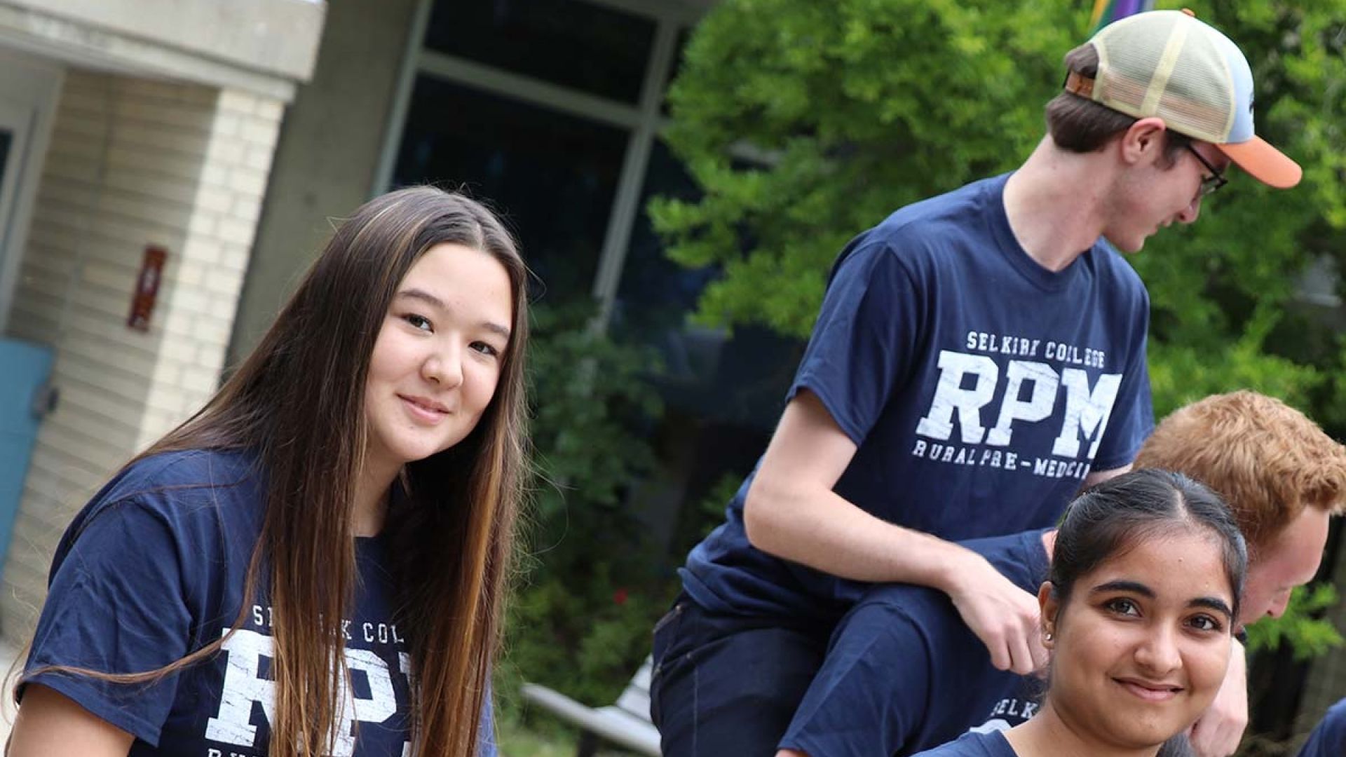 A group of students wearing RPM shirts