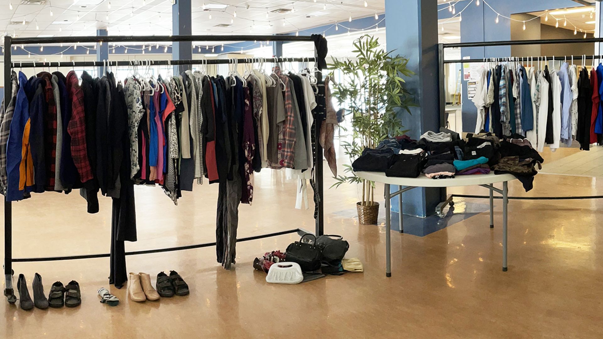 Clothing hanging on racks within a common space at Selkirk College