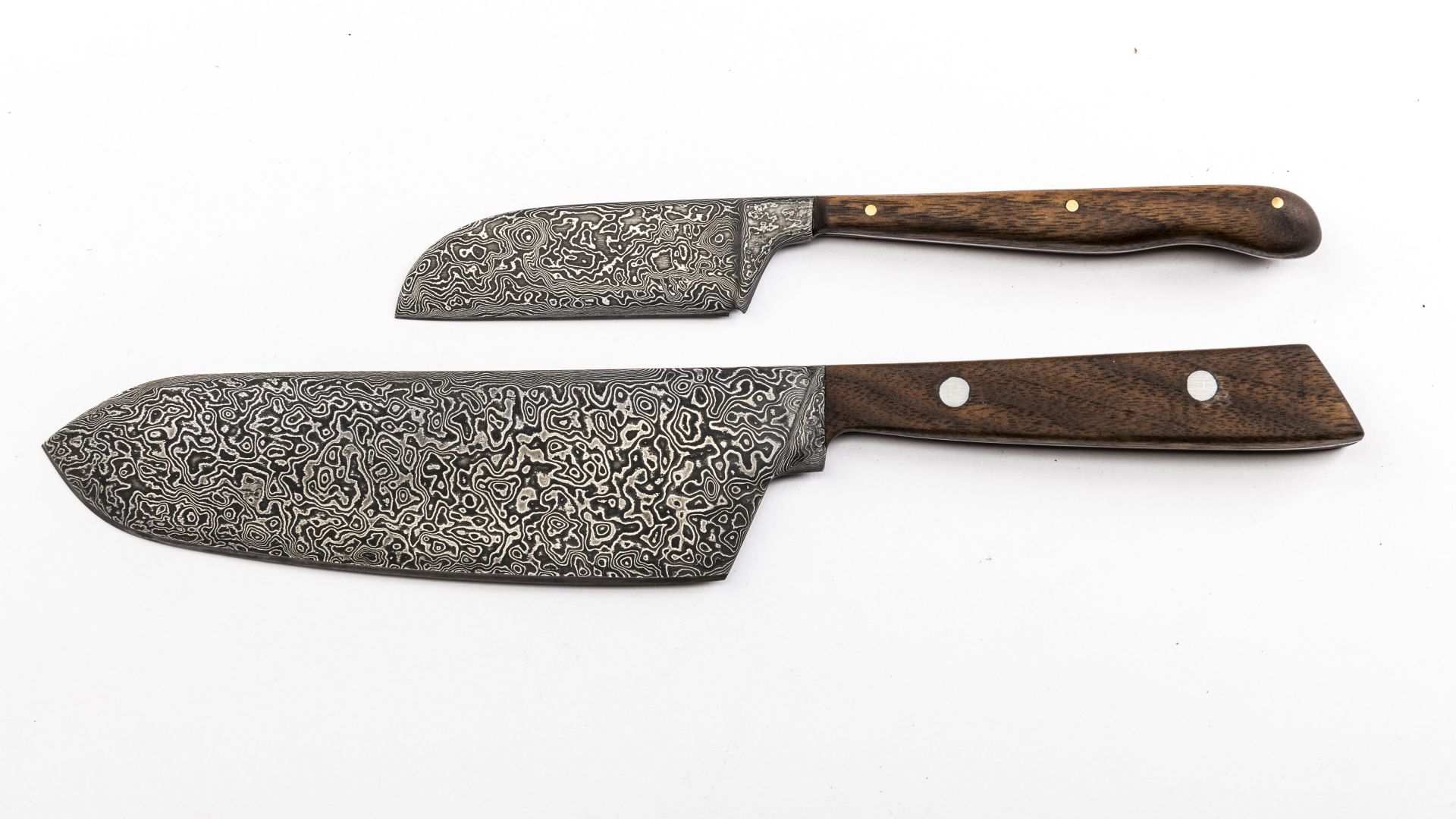Two metal knives with wooden handles