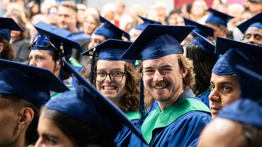 Selkirk College students smiling at Convocation