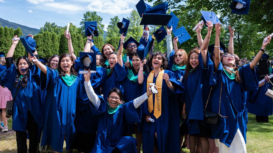 Group of students cheering at Convocation