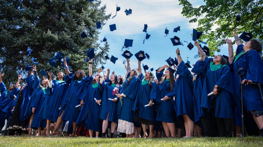 Students throw their caps at Convocation