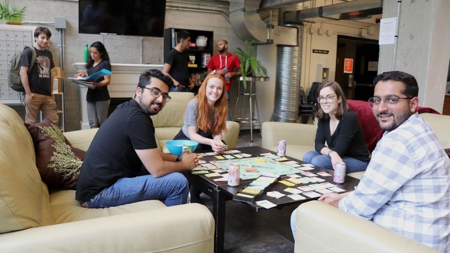 Students playing board games at student housing