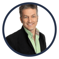 Board of Governors member Roly Russell smiles