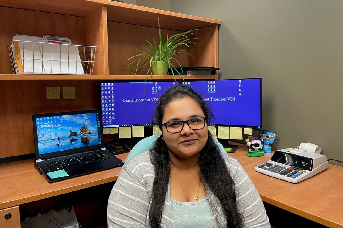 Co-op students working at a local business