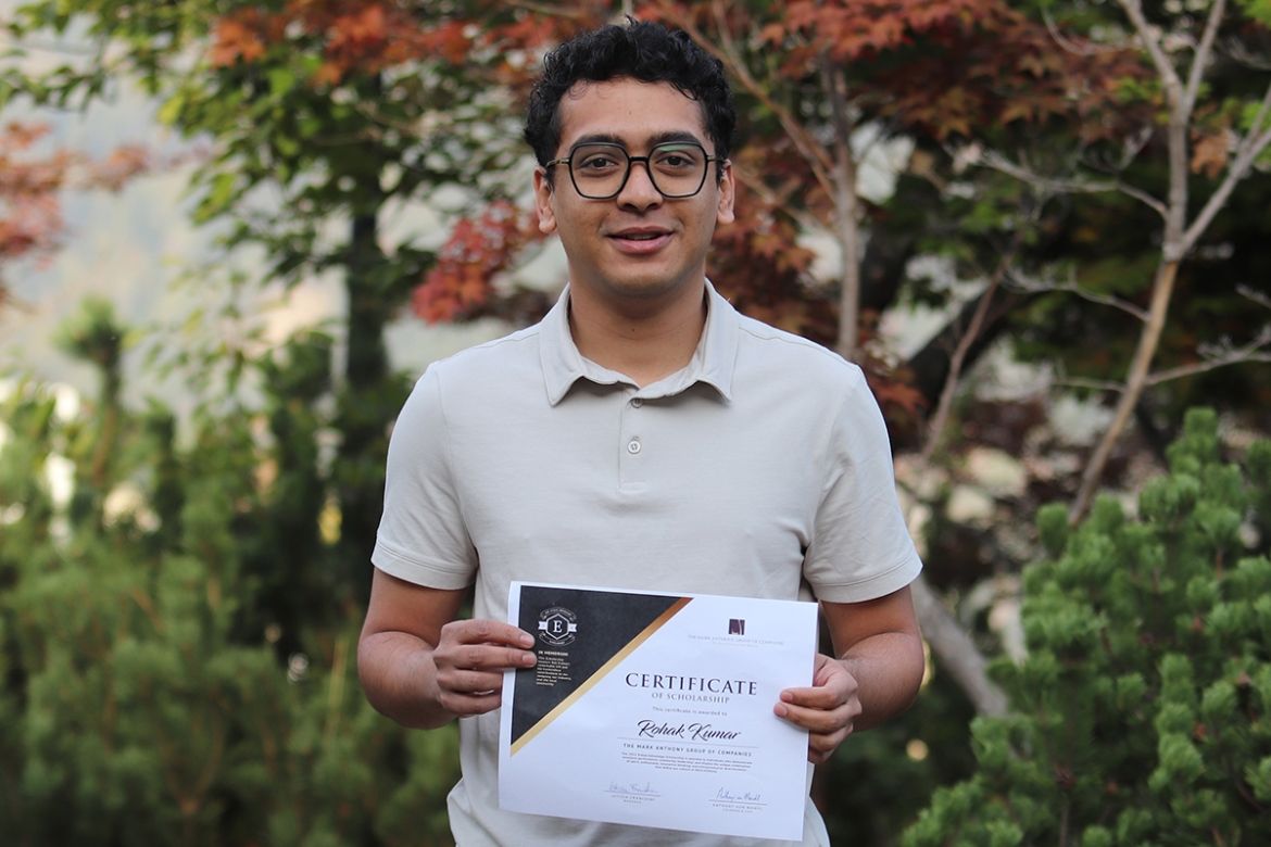 Rohak Kumar with an external award