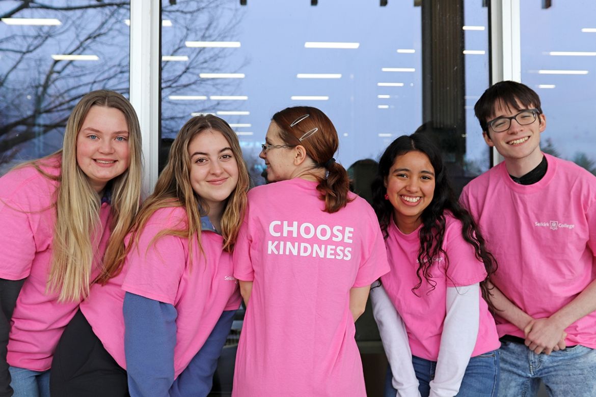 Student Ambassadors wearing Pink Shirts