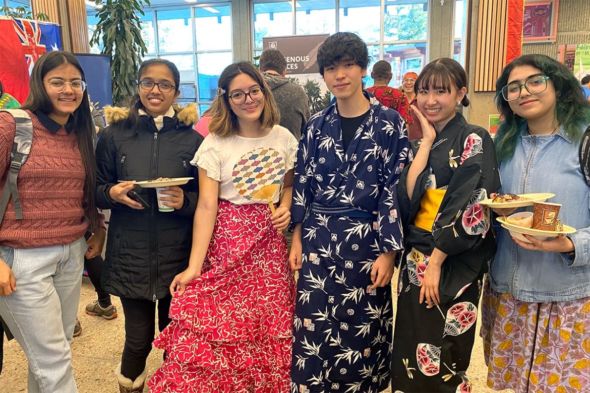 Students smiling at Intercultural Faire at Castlegar Campus