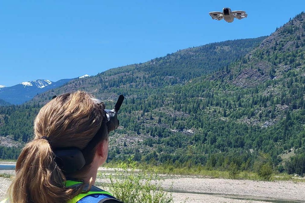 A student flies a drone outside