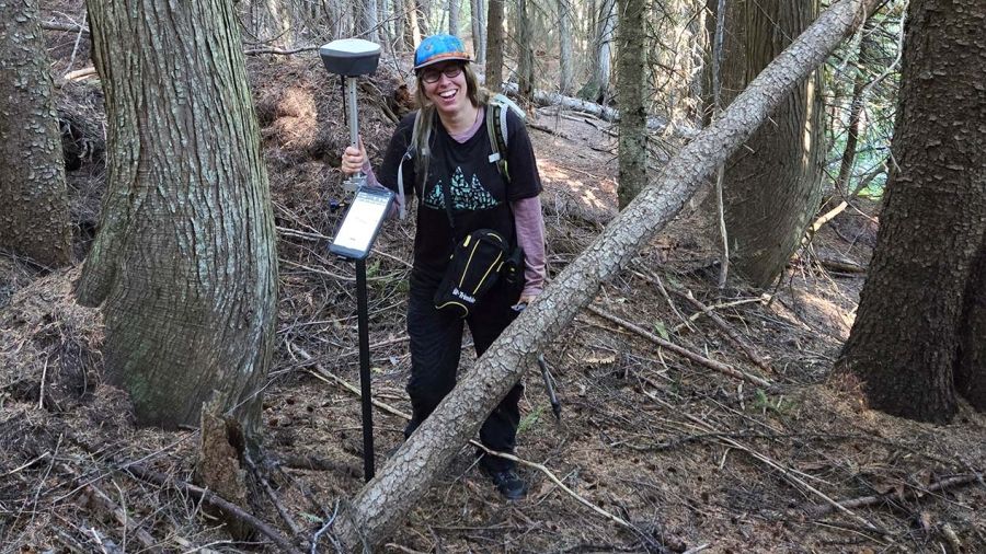 Alumna Alana Block works in the forest