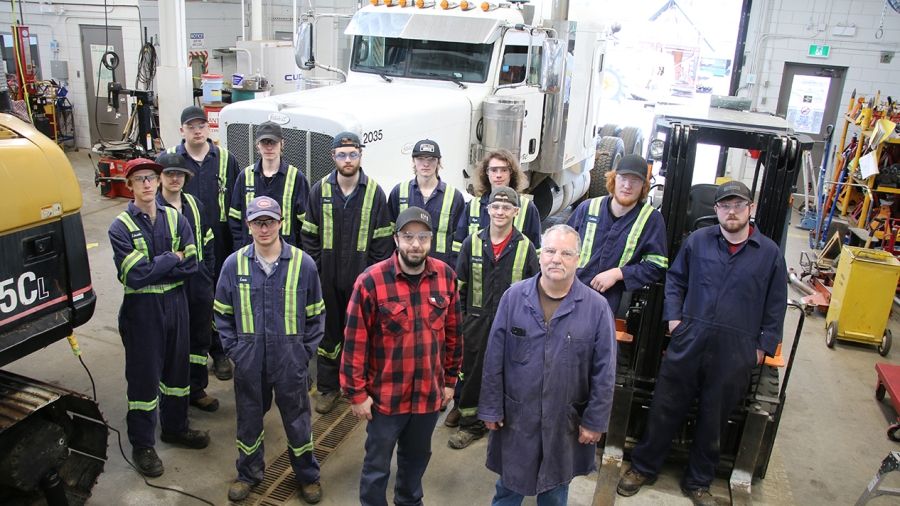 Summit visits heavy mechanics shop three