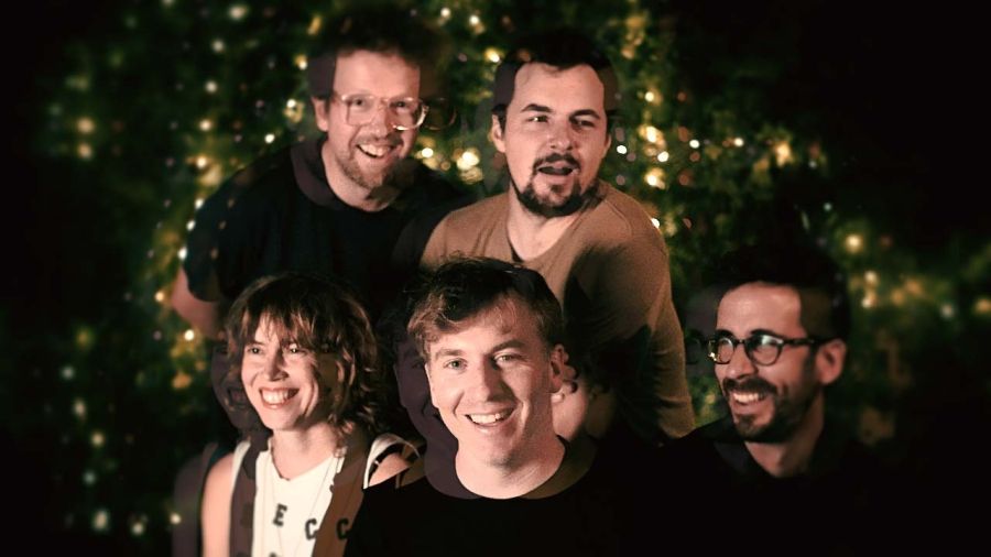 Five musicians smiling