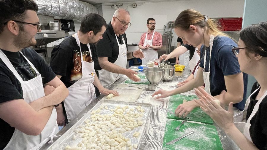 Students make gnocchi together