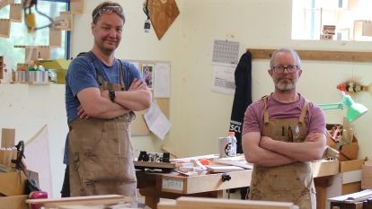 Two of the students who will presenting pieces in the Fine Woodworking Show &amp; Sale, Jon Breisnes and Jacques Beaurain (right) take a break from the final days of preparation.