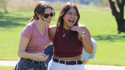 Rural Pre Medicine Program student Grace Cline laughs with her classmate