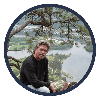 Myler Wilkinson sits outside by the river