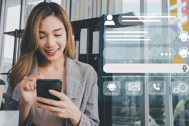 A picture of a woman holding a phone 