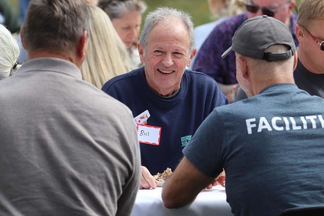 Facilites staff chat at welcome back barbecue