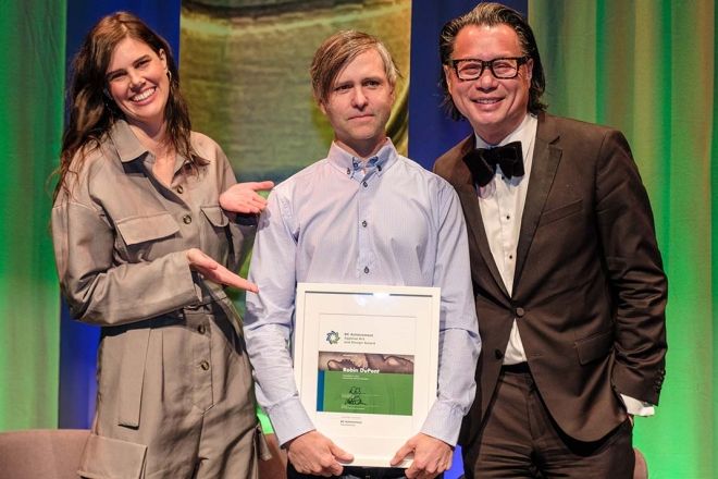 Robin DuPont (in the middle) receives a BC Achievement Award