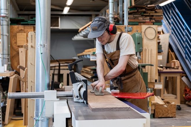 A Fine Woodworking students works on a project
