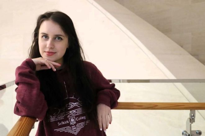 Selkirk College student EK Murray at her campus in Korea