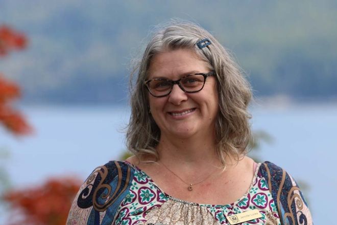 Academic Upgrading instructor Jenn Lucke stands outside smiling