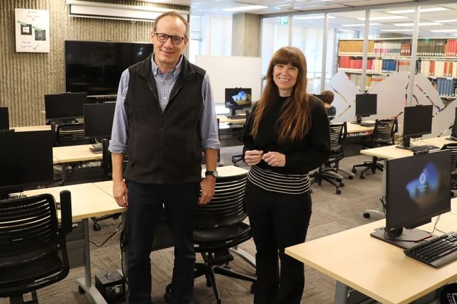 Selkirk College librarians Gregg Currie (left) and Sarah James (right) have been welcoming students to dive deeper into their studies in the new computer lab on the Castlegar Campus. 
