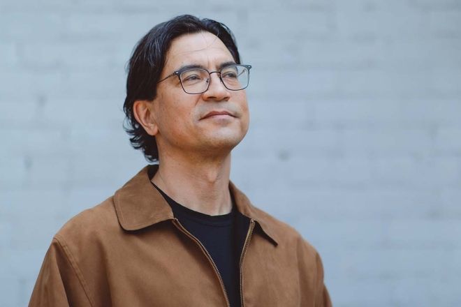 Duncan McCue stands outside