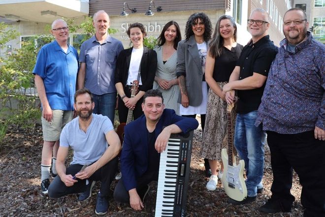 The current Contemporary Music & Technology Program faculty stand in a group